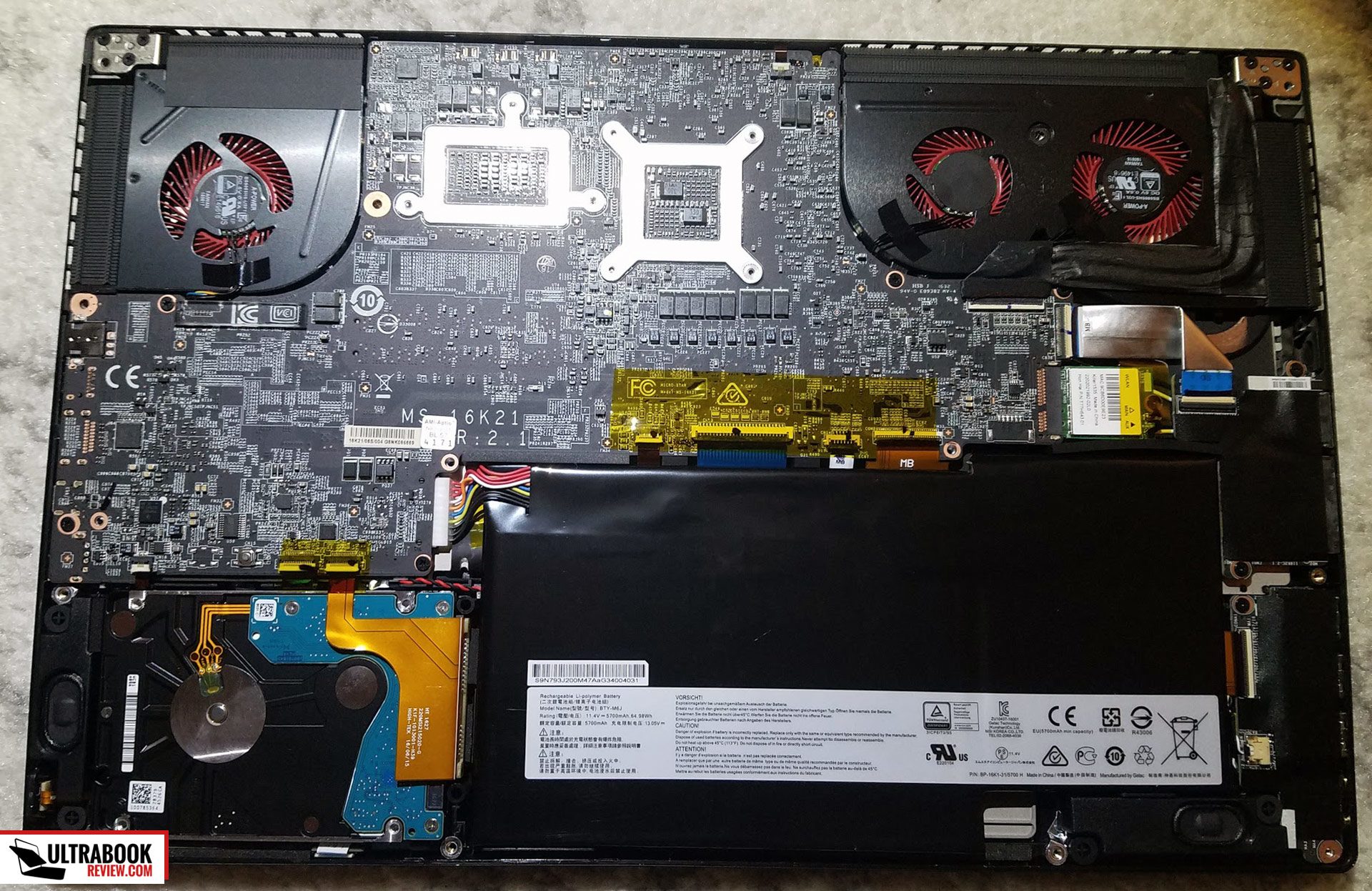 Internals - HDD easily accessible, but the SSD and the RAM are behind the motherboard