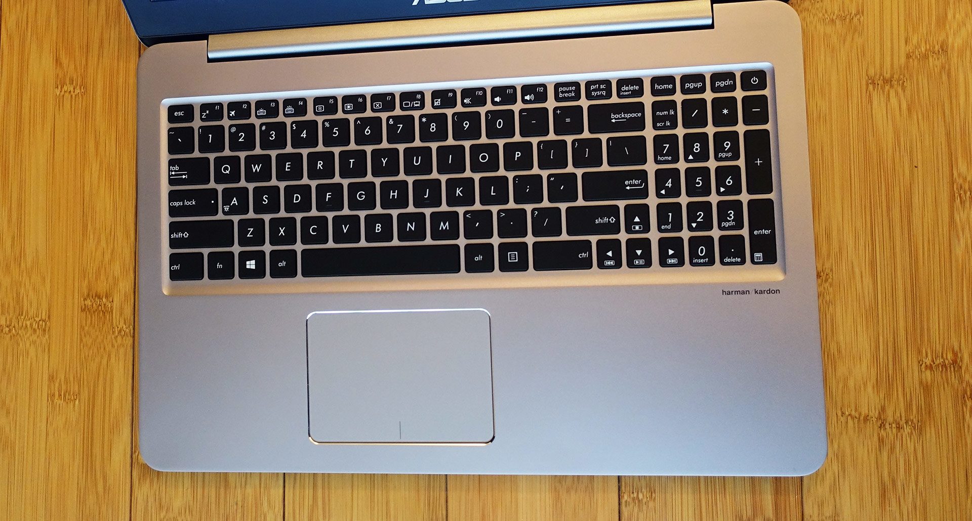 The UX510 gets a backlit full-size keyboard and a large trackpad