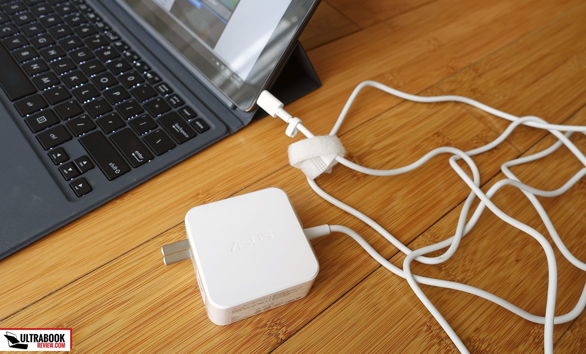 A 45W white power-brick and charging cables are included